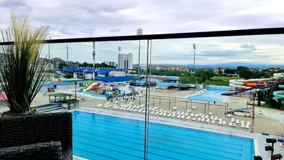 a view of a swimming pool from a hotel room at RELAX LUX AKVA PARK(K-KOMPLEX) in Jagodina