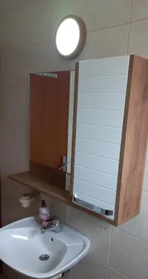 a bathroom with a sink and a mirror at Studio Isidora in Vrnjačka Banja