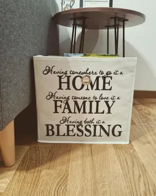a sign that says home family blessing on a floor at Iskra Sparkle apartman in Soko Banja