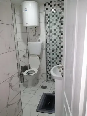 a bathroom with a toilet and a sink at Panorama in Vrnjačka Banja