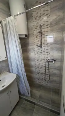 a bathroom with a shower and a sink at Apartman 2 Miljković in Soko Banja