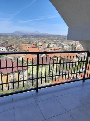 a balcony with a view of a city at Studio Mina in Soko Banja