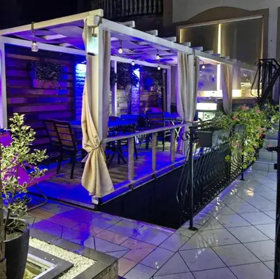 a room with purple lights on a balcony at Premium Urban Life in Zaječar