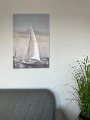 a painting of two sailboats in the ocean at Sailboat Apartment in Niš
