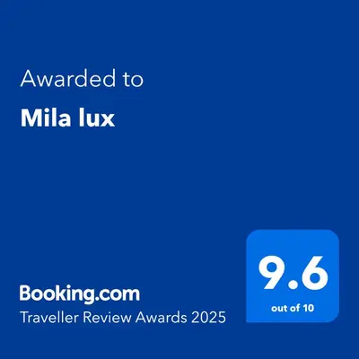 a screenshot of a cell phone with the text awarded to milka uk at Mila lux in Niš
