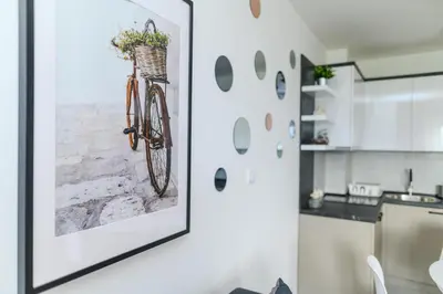 a picture of a bike hanging on a wall in a kitchen at AQUA LUX - Green Hill - Kod akva parka Podina in Soko Banja