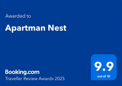 a blue screen with the text awarded to a participant nest at Apartman Nest in Vranje
