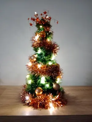 a christmas tree sitting on a table at Apartman 4M in Vrnjačka Banja