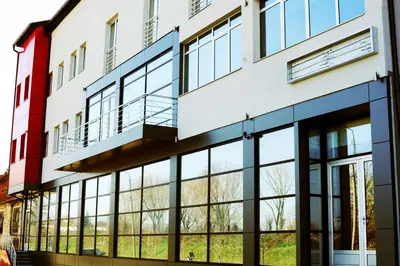an office building with large windows at Garni Hotel Crystal Ice in Niš