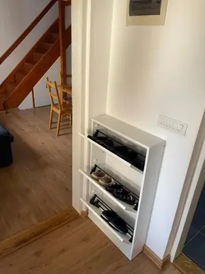 a wine cabinet in the corner of a room at Rustic Villa in Jagodina
