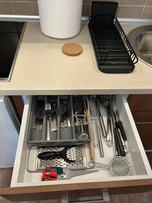 a drawer in a kitchen with utensils at Apartman Sunce in Vrnjačka Banja