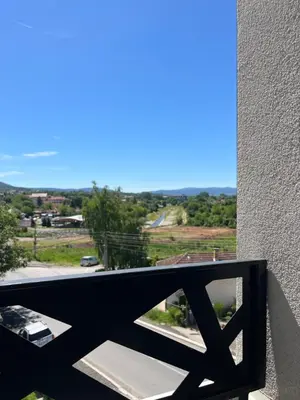 a view from the balcony of a house with a car at Vila Sunset in Soko Banja