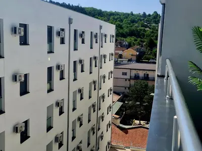 an aerial view of a white building with windows at RELAX LUX AKVA PARK 2(K-KOMPLEX) in Jagodina