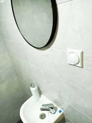 a bathroom with a sink and a mirror at Жути Ранац - Žuti Ranac - Yellow Backpack in Boljevac
