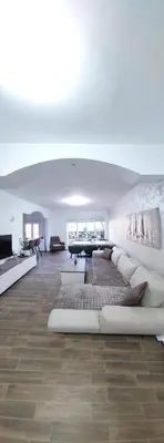 a large living room with a couch and a table at MAFI AS APARTMAN in Soko Banja