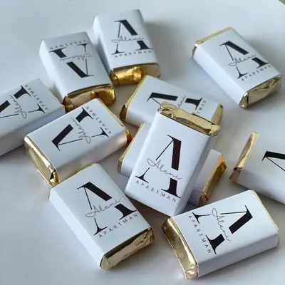a pile of gold bars with the letter k on them at Apartman Aleni - Bela Reka, Brzeće in Brzeće