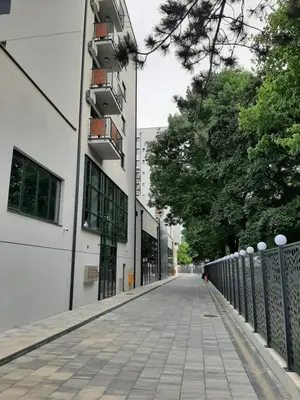 an empty street next to a building at Apartman Luxor in Jagodina
