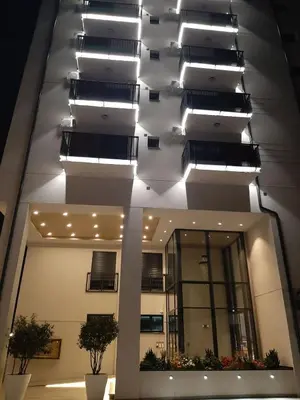a building with a bunch of lights on the ceiling at Apartman Luxor in Jagodina