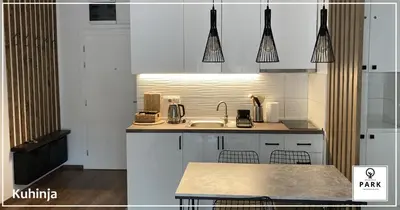 a kitchen with a sink and a counter top at Apartman Park Promenada in Vrnjačka Banja