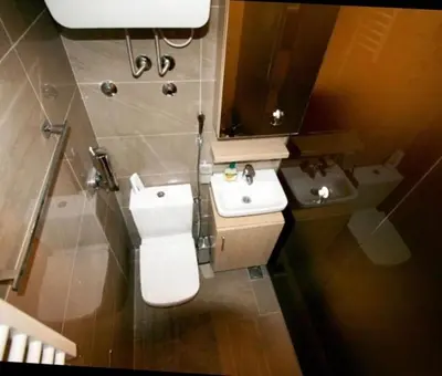 a bathroom with a toilet and a sink at Vila Pahulja - Konoba 1 in Kopaonik