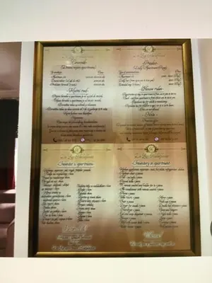 a picture of a menu in a frame at De Lux Nedeljkovic in Jagodina