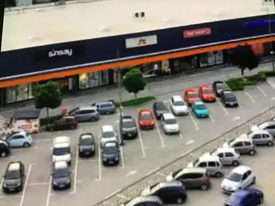 a model of a parking lot filled with cars at De Lux Nedeljkovic in Jagodina