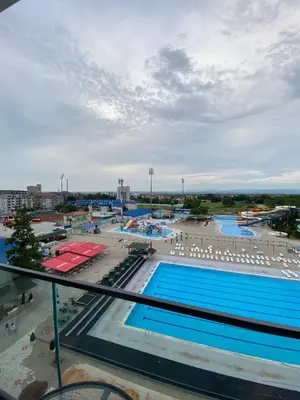 a view of a swimming pool in a resort at Aqua Panoramic Apartments in Jagodina