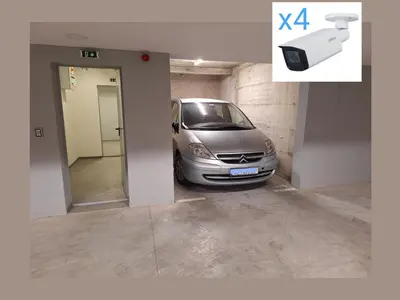 a silver car parked in a parking garage at Lux apartment 13 center, free parking in Niš