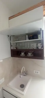 a kitchen counter with a sink in a kitchen at Lux apartment 10 center, free parking in Niš