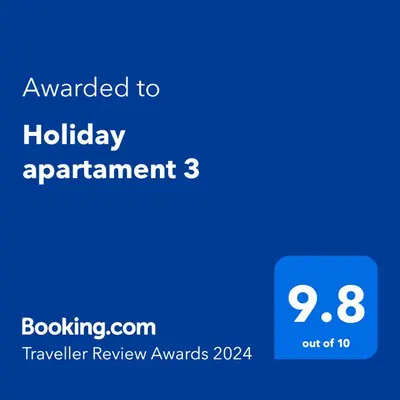 a screenshot of a phone with the text wanted to holiday apartment at Holiday apartament three in Niš