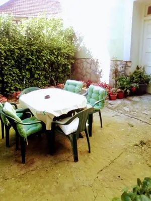 a table and four chairs on a patio at Timočko gnezdo in Zaječar