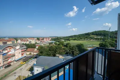 a view of a city from a balcony at Lux Apartman Sunce in Jagodina