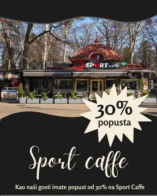 a sign for a spot cafe in front of a building at Duma Apartmani Vrnjačka Banja in Vrnjci