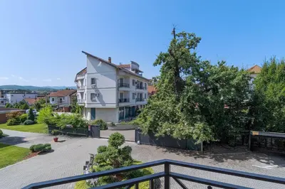 a view from the balcony of a house at Duma Apartmani Vrnjačka Banja in Vrnjci
