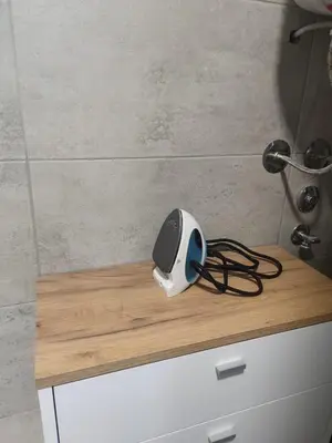 a hair dryer sitting on top of a counter at Apartman Dunjic in Vrnjačka Banja