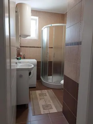 a bathroom with a shower and a sink at Apartment Vojinović in Soko Banja