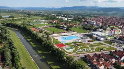an aerial view of a city with a amusement park at Loft Luxury Apartment in Pirot