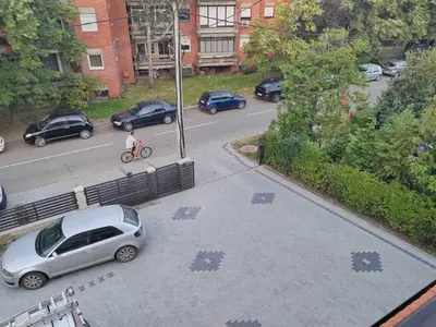 an aerial view of a parking lot with a car at Apartmani Zvezdana in Vrnjačka Banja