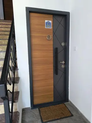 a wooden door with a sign on it at MP Apartman in Soko Banja