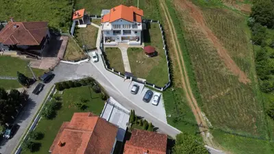 an aerial view of a large house with a driveway at Vila Kruna in Soko Banja