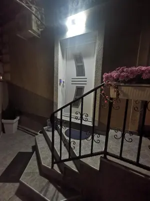 a stairway leading to a door in a building at DJERDAN in Vranje