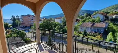 a view of a city from a balcony at Apartmani Talija 3 i 4 Sokobanja in Soko Banja