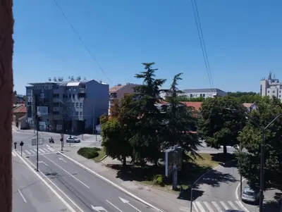 an aerial view of a city street with buildings at Sedmi Juli in Niš