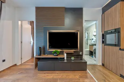 a living room with a large flat screen tv at Apartman Riva in Vrnjačka Banja