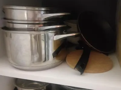a pot and pans sitting on a shelf at La Vie En Rose - Milmari Resort in Kopaonik