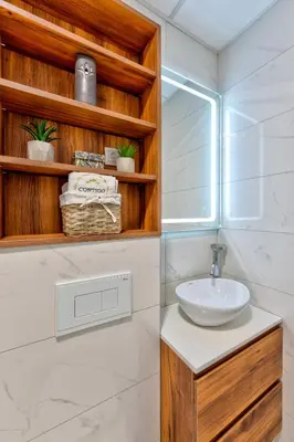 a bathroom with a sink and a window at Contigo Apartman Vrnjacka Banja - Vrnjacka promenada in Vrnjačka Banja
