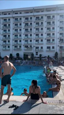 a group of people in a swimming pool at Skandik Luxe Residence in Jagodina