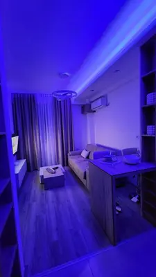 a living room with a couch and a table at apartman gold Jagodina in Jagodina