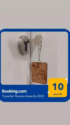 a tag attached to a door with a key at Tilia Home in Vrnjačka Banja