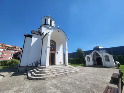 a small white church with steps in front of it at Azur in Jagodina
